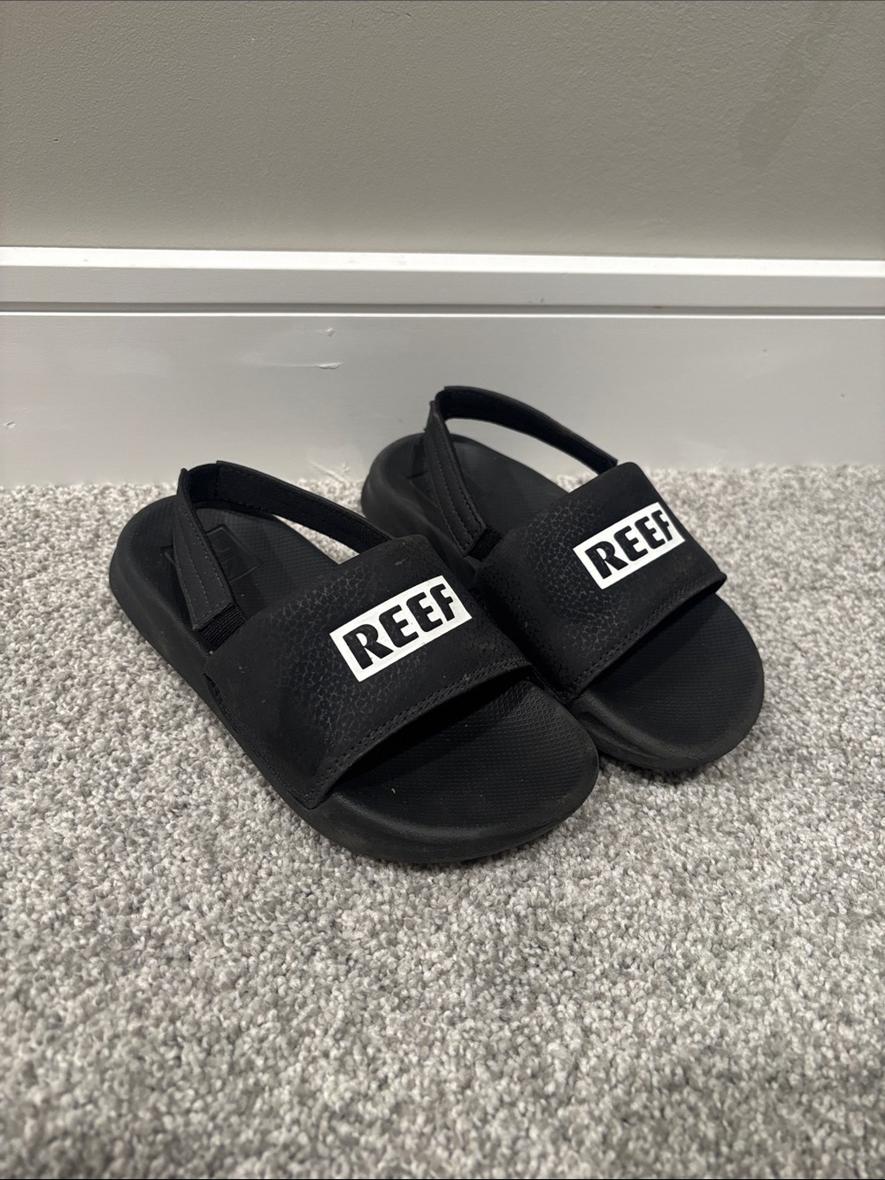 Reef Kids Black Slip-On Sandals with REEF Logo